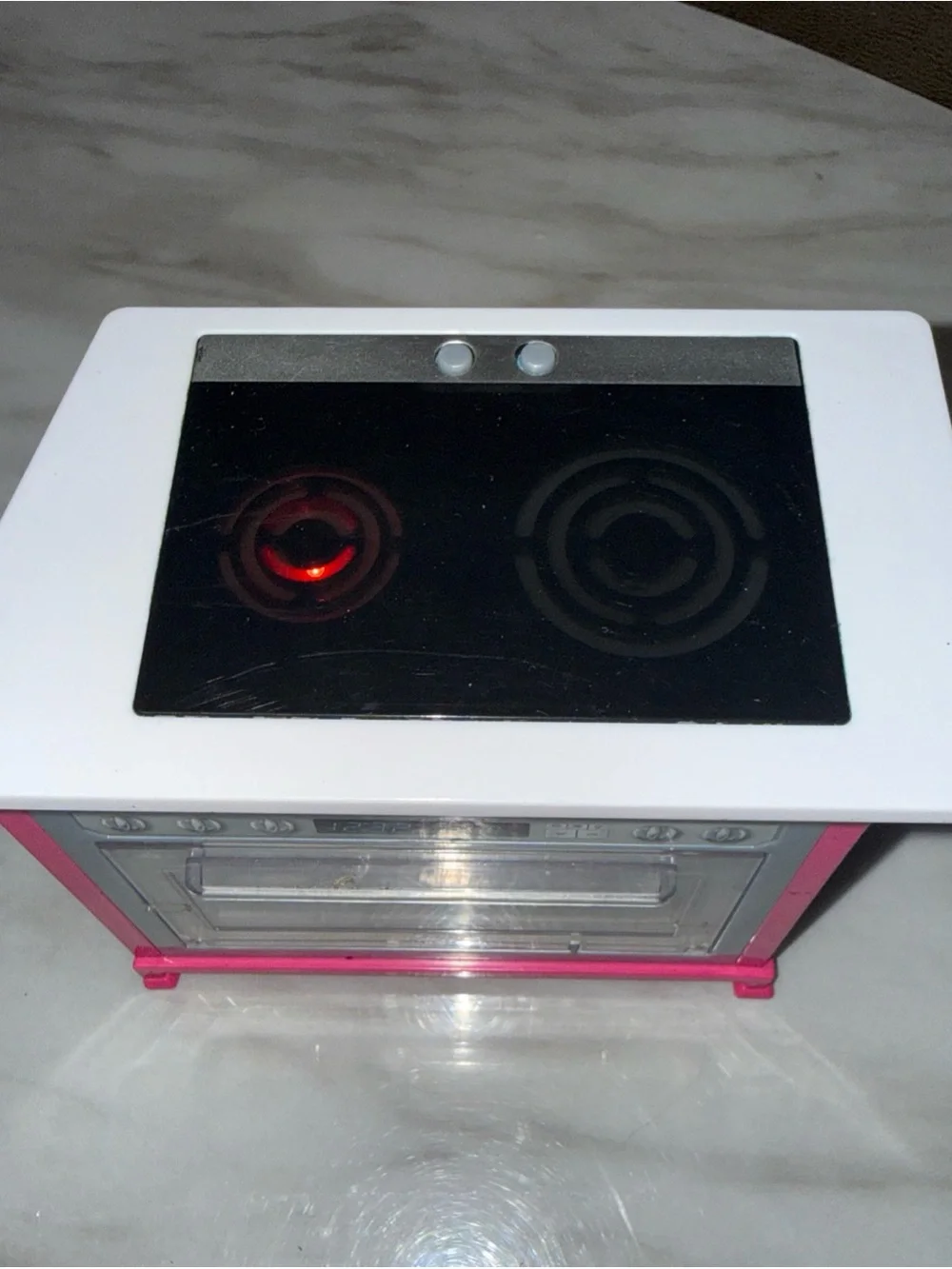 Barbie Dreamhouse stove, oven lights up and makes noise